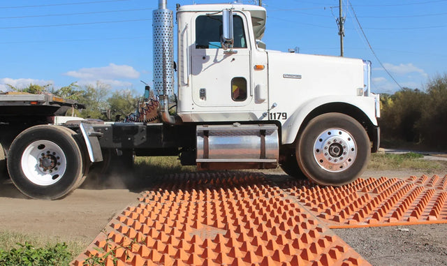 DiamondTrack trackout mat top view showing raised diamond tread features for tire scrubbing