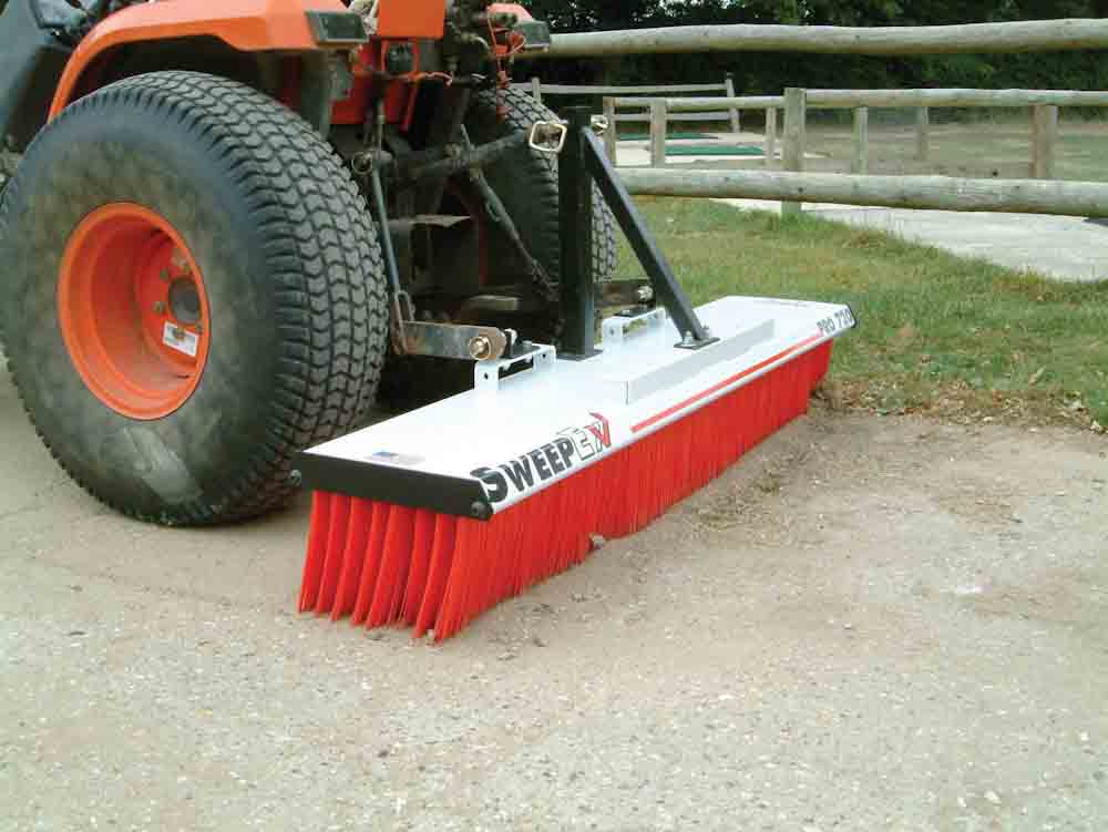Sweeping with industrial broom