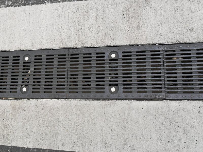 Close-up of the ACO FG200 ductile iron slotted trench drain grate
