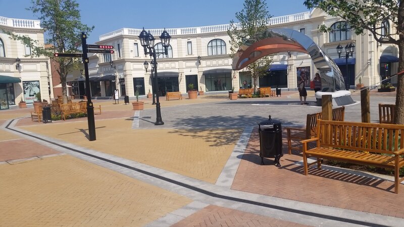 ACO K100 channel drain in a shopping area walkway
