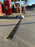 ACO PowerDrain S100K channel drain across a gas station forecourt
