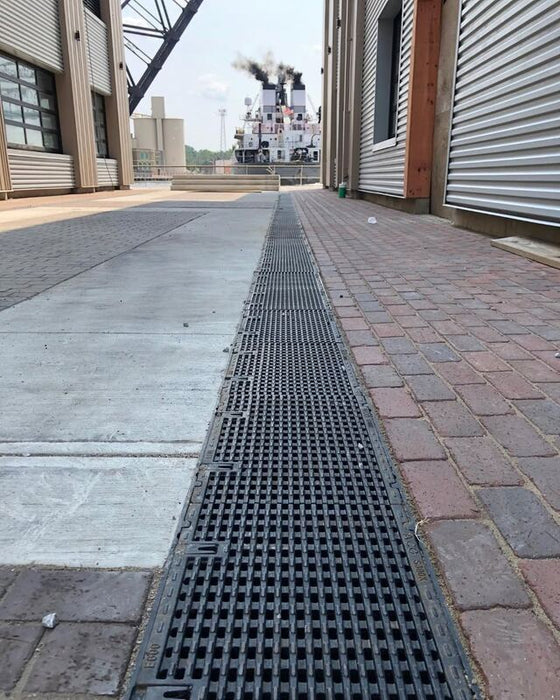 ACO PowerDrain S300K channel drain on an industrial dock
