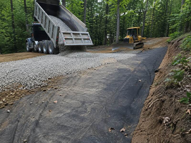 Gravel driveway fabric stabilizing the driveway base

