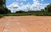 Large MegaDeck HD+ ground protection mat platform laid out across an open field jobsite

