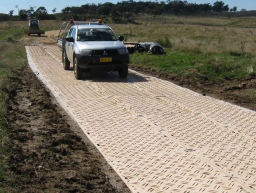 Duradeck ground protection mats being driven on